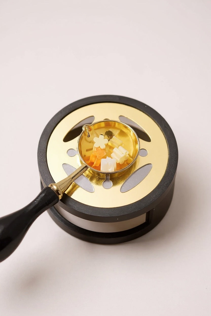 Viaszpecsét melegítő – olvasztó kanállal